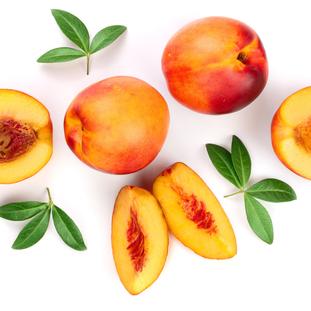 Ripe Nectarine With Leaves Isolated On White Background. Top View. Flat Lay Pattern
