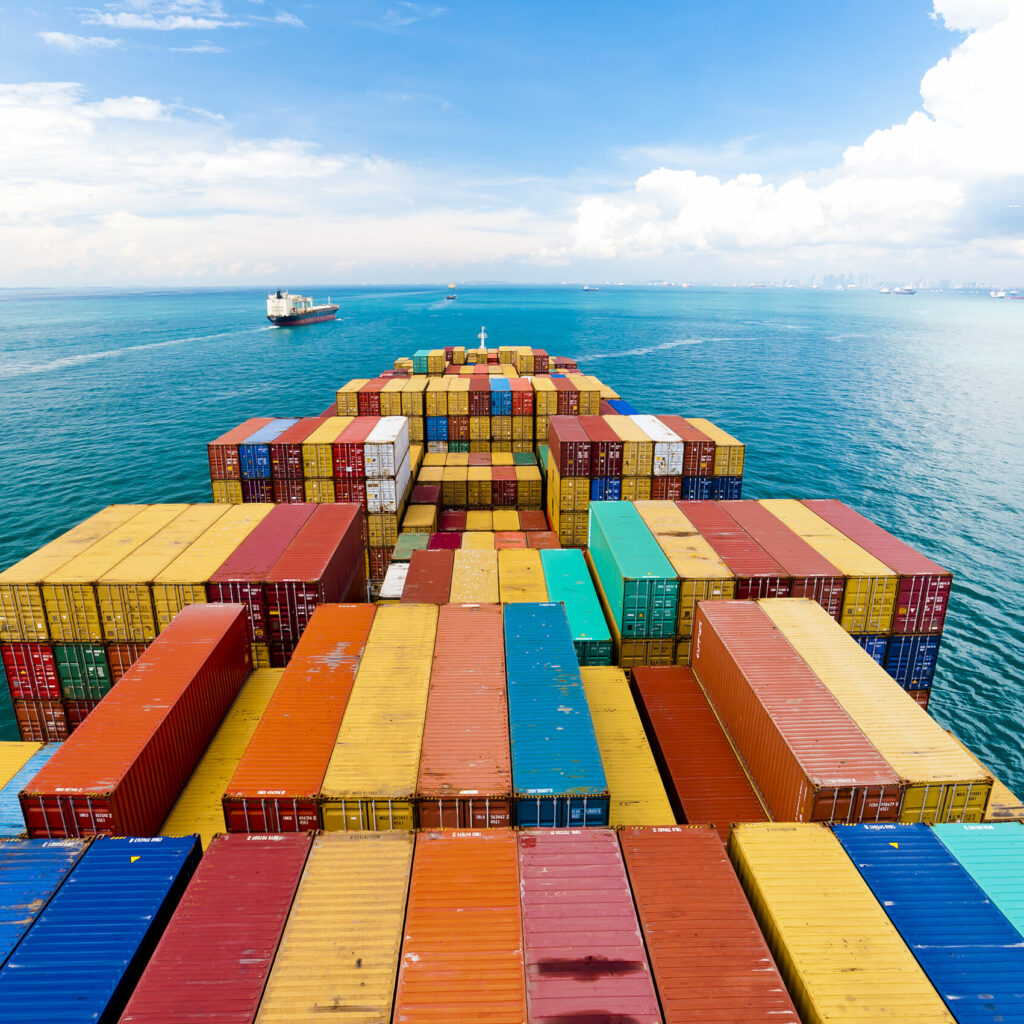 Cargo Ships Entering One Of The Busiest Ports In The World, Singapore.